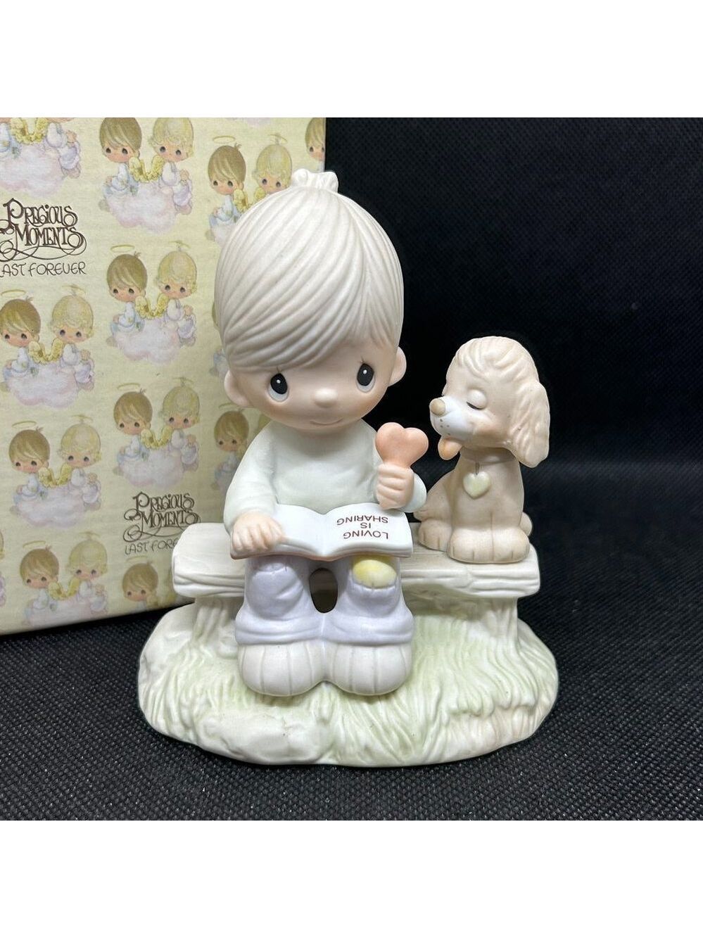 Precious Moments "Loving is Sharing" boy figurine